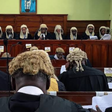 Man accused of killing three people collapses and dies after judge adjourns judgment in his trial