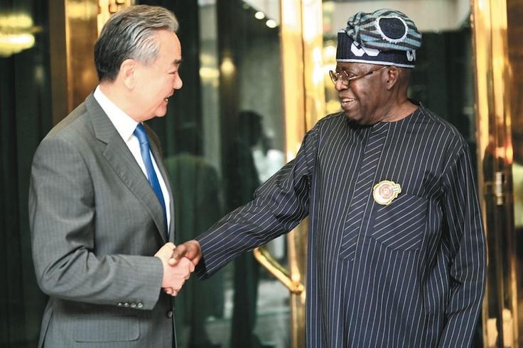 President Bola Tinubu and the Minister of Foreign Affairs of China, Wang Yi [Presidency]