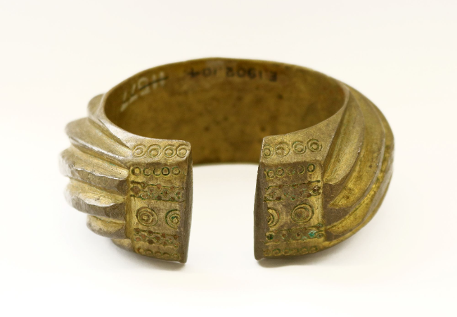 A brass-decorated bracelet