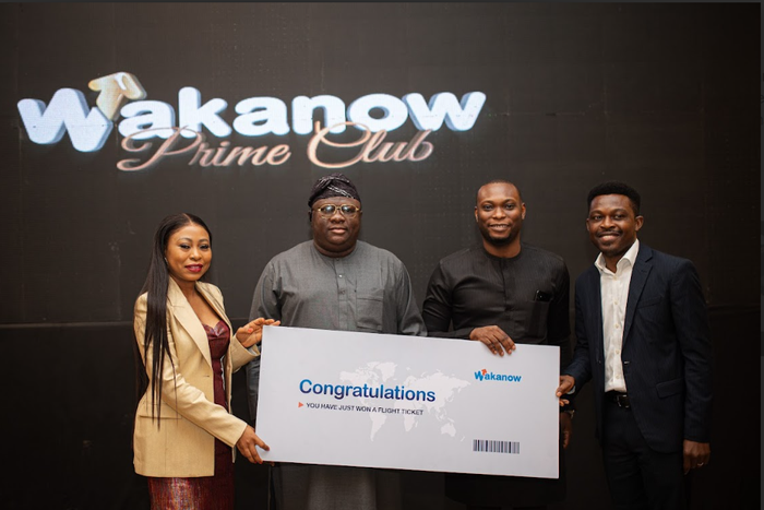 Wakanow Prime Club member beams with excitement after winning the bid for an Air France business class ticket to any destination in Europe during the lively ticket auction at the Wakanow Prime Club launch.