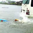 Surviving Lekki flood - how to get to work without staining your suit