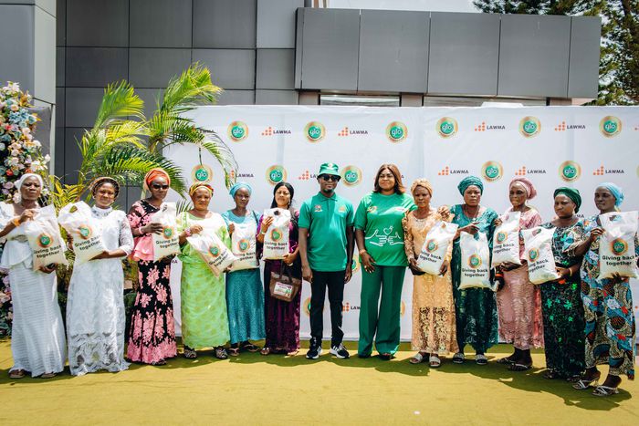 LAWMA MD, Dr Muyiwa Gbadegesin (7th left), Head Corporate Social Responsibility, Globacom, Mrs Jumobi Mofe-Damijo (8th left) with the some staff members of the authority at the Rest and Relaxation event held by Glo Foundation to appreciate  LAWMA staff.