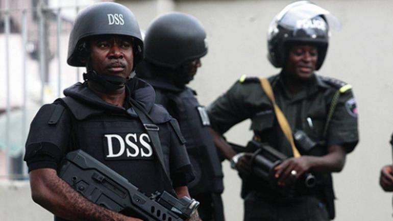Department of State Services DSS operatives and Nigerian police officers in uniform holding security equipment are on high alert.