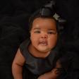 Adorable face reveal portrait of baby Eliana Atere