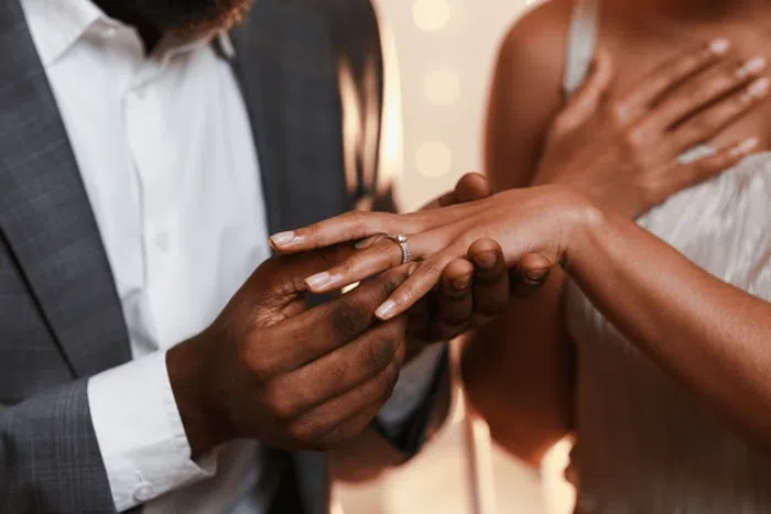 South African apex court grants men right to adopt wives' surnames.