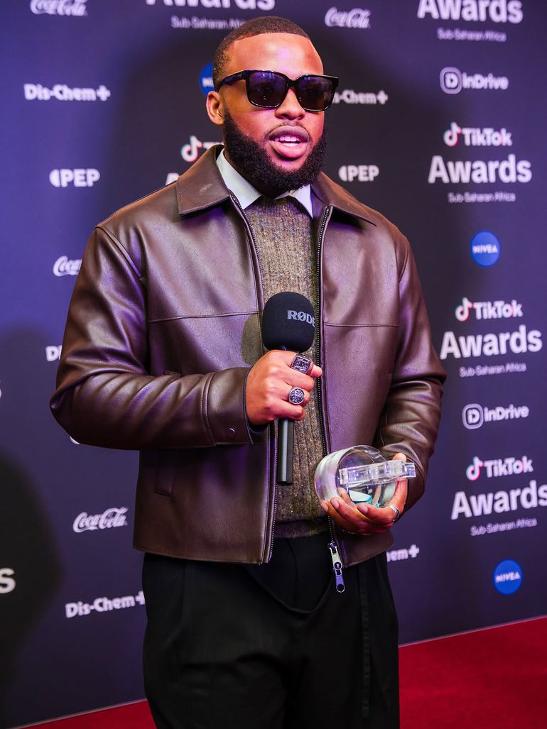 Brian Nwana poses with his TikTok Africa Storyteller of the Year award | Credit: Instagram