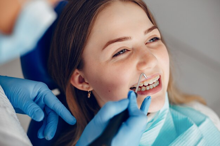 How orthodontists fix misaligned teeth and improve oral health