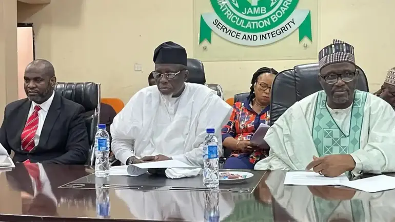 JAMB Registrar, Prof. Ishaq Oloyede, and officials announcing the new national cut-off marks and age requirements.