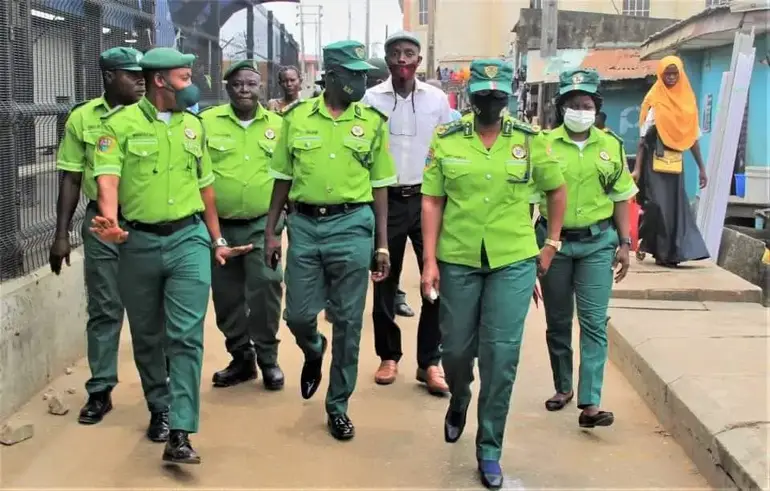 Lagos Environmental Sanitation Corps (KAI) officers on patrol during an environmental cleanup and enforcement operation in Lagos.