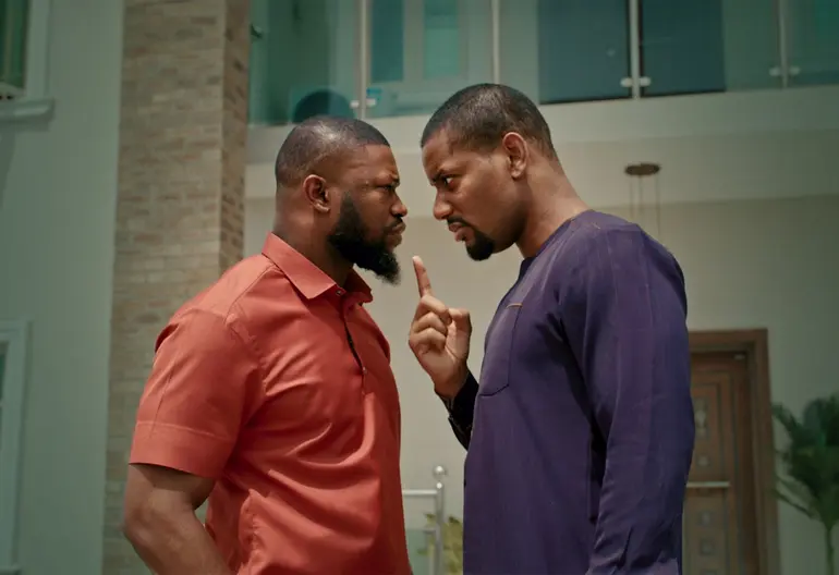 Nollywood actor Alexx Ekubo in an intense face-to-face confrontation scene from the movie Áfàméfùnà: An Nwa Boi Story.
