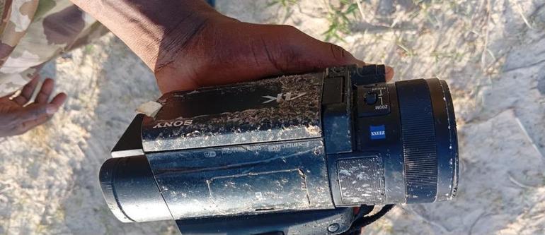 A close-up of a dusty Sony 4K camcorder recovered from a dead ISWAP media operative.