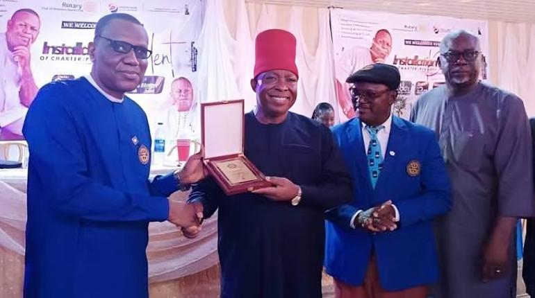 Chief Joseph Ezeokafor Snr (centre), founder of Jezco Group, receiving a leadership award with officials in attendance.