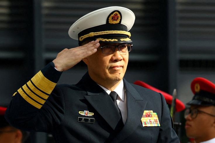 China warns US not to meddle in its affairs as its ships continue passing through Strait of Hormuz
