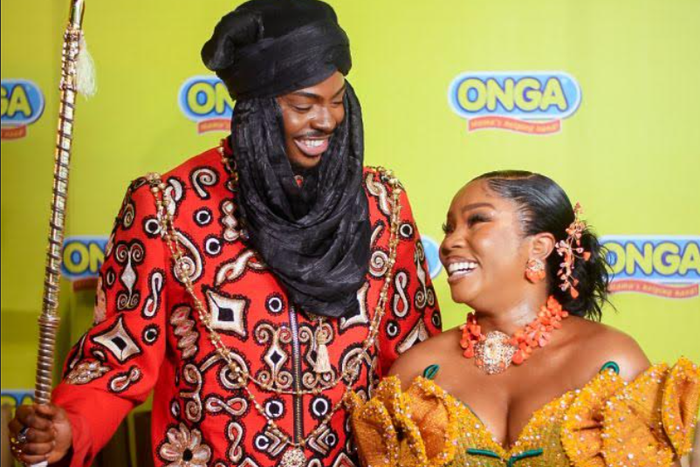 Enioluwa Adeoluwa and Bamike Olawunmi-Adenibuyan (Bambam), host, showing excitement at the Onga Village.