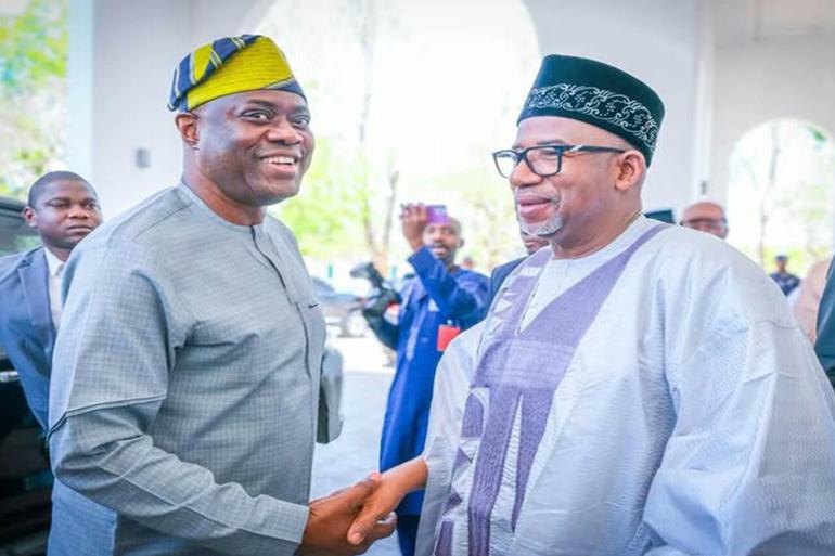 Oyo State Governor Seyi Makinde shares a warm handshake with former running mate, Bauchi State Governor Bala Mohammed.