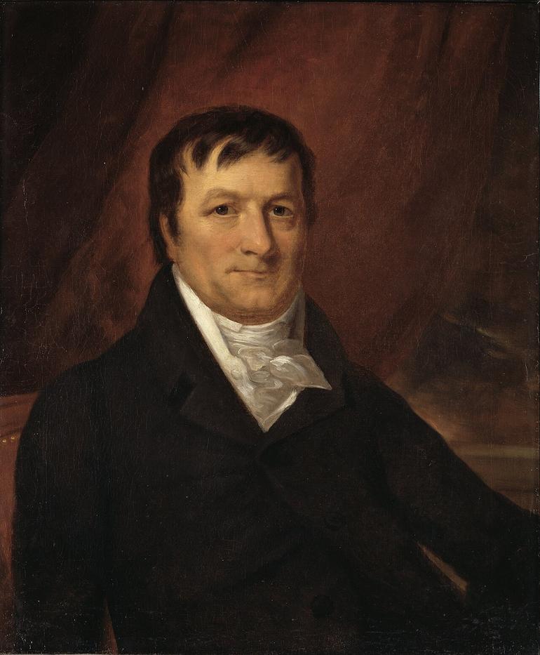 An oil painting portrait of John Jacob Astor in a dark jacket and a white cravat against a warm background.