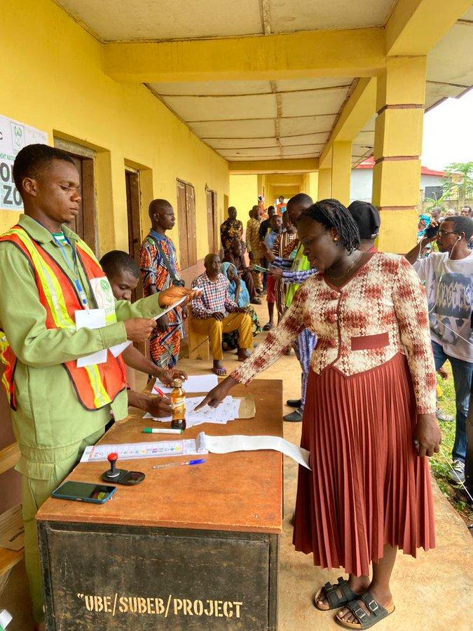 A voter completing accreditation procedures at a polling station in Oriade Local Government Area during the Osun governorship election.