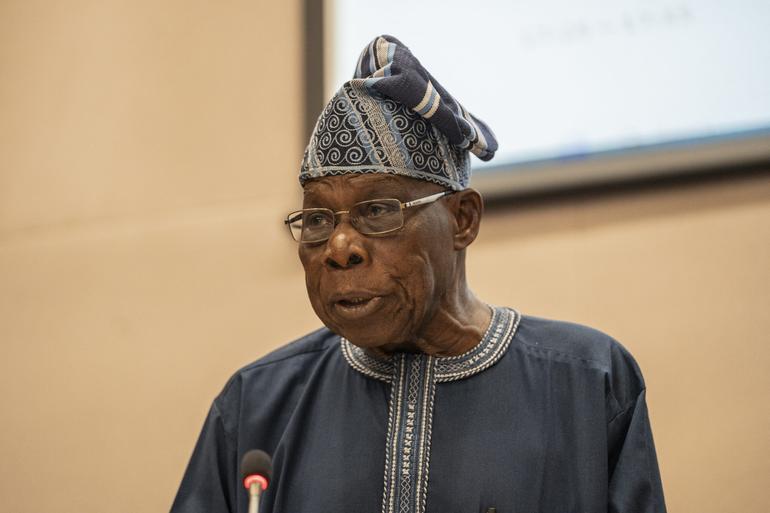 Former President Olusegun Obasanjo addressing Africa's democratic model and political governance challenges.