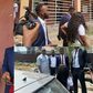 PHOTOS: Sowore storms NYSC office with embattled corper who criticised Tinubu
