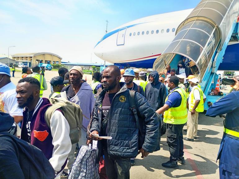 Nigerians evacuated from South Africa lands at Murtala Muhammed International Airport in Lagos.