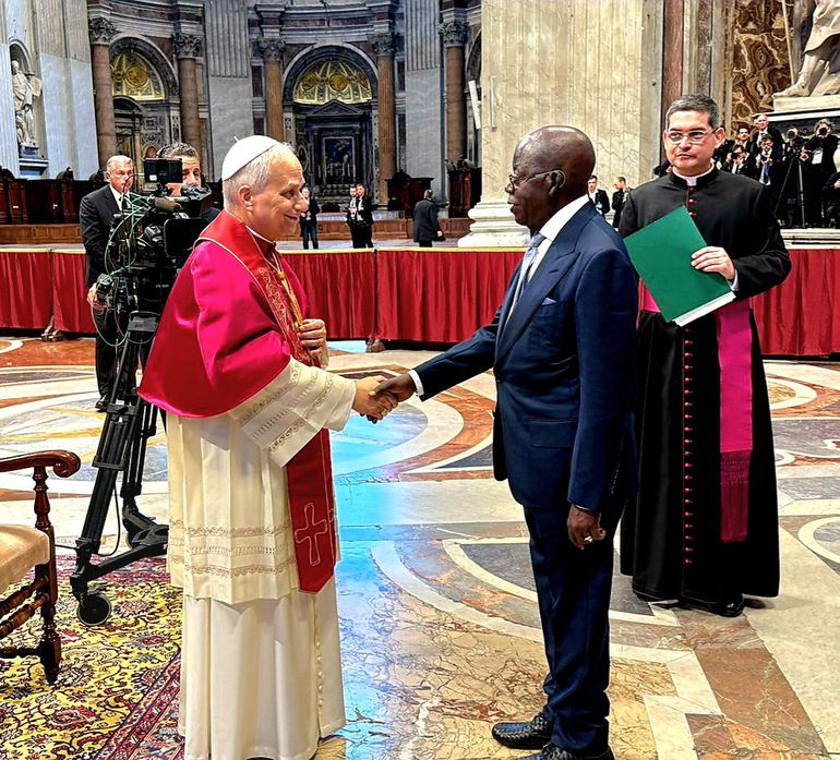 President Tinubu shakes hands with Pope Leo XIV after the inauguration mass at the Vatican.