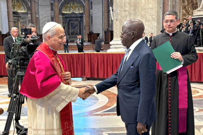 President Tinubu shakes hands with Pope Leo XIV after the inauguration mass at the Vatican.