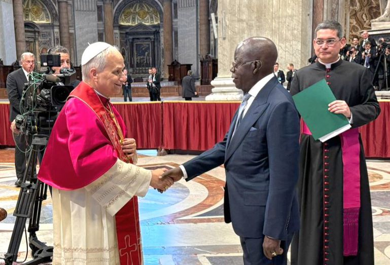 President Tinubu shakes hands with Pope Leo XIV after the inauguration mass at the Vatican.
