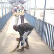 Lagos hoodlums forced to sweep pedestrian bridge for defecating on it