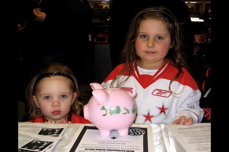 Juliette Lamour and her younger sister donated their shared $61.38 piggy bank savings to Haiti earthquake relief in 2010.