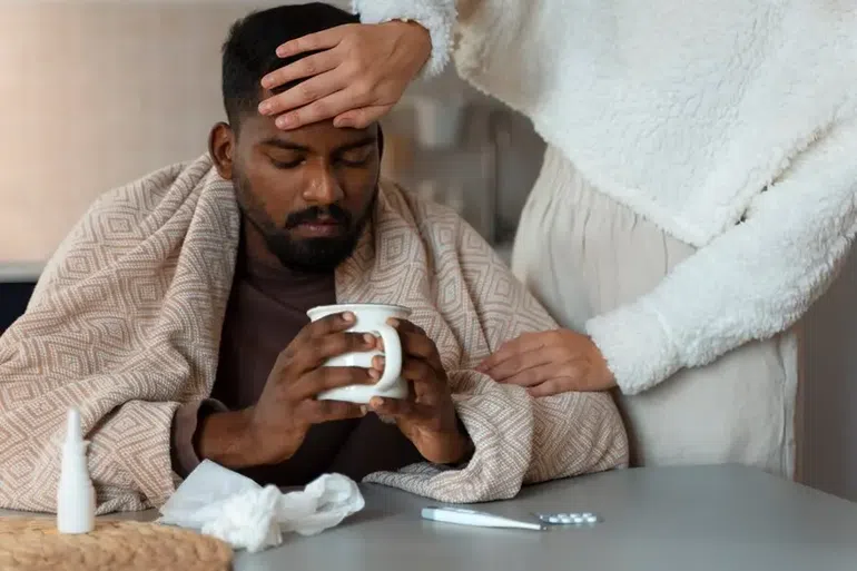 a young man suffering from typhoid fever