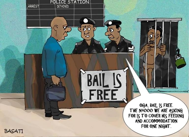 Editorial cartoon showing a Nigerian police station counter with a sign saying Bail is Free while an officer asks a citizen for money covering feeding and accommodation.