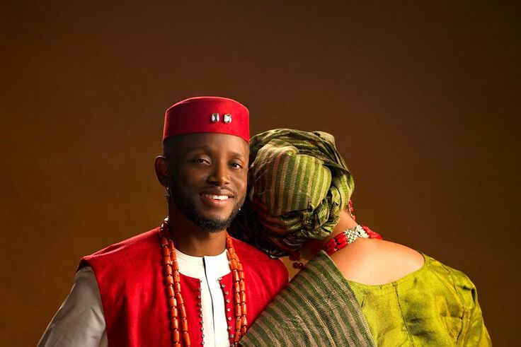 Fans left confused as singer Chike poses with mystery woman in new post