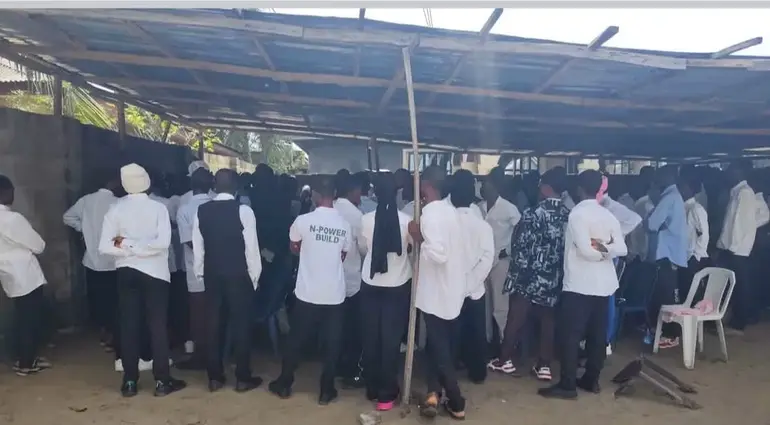Rescued students assembled at the makeshift shelter of the illegal university uncovered by NSCDC operatives in Ilado, Badagry, Lagos State.