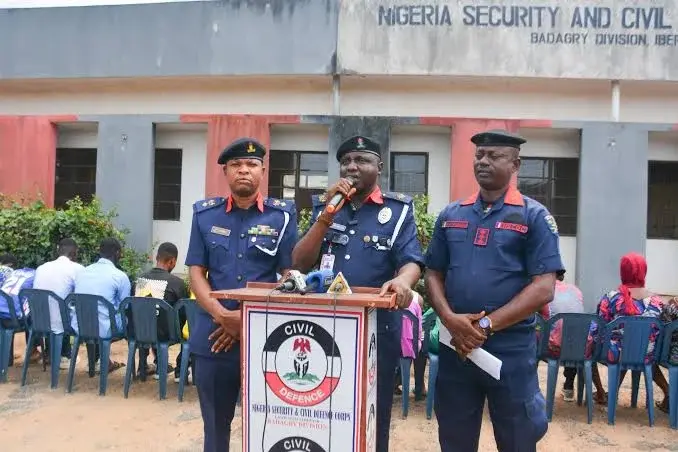 NSCDC Badagry Division officers addressing journalists during a press briefing on the illegal university raid and rescue operation.