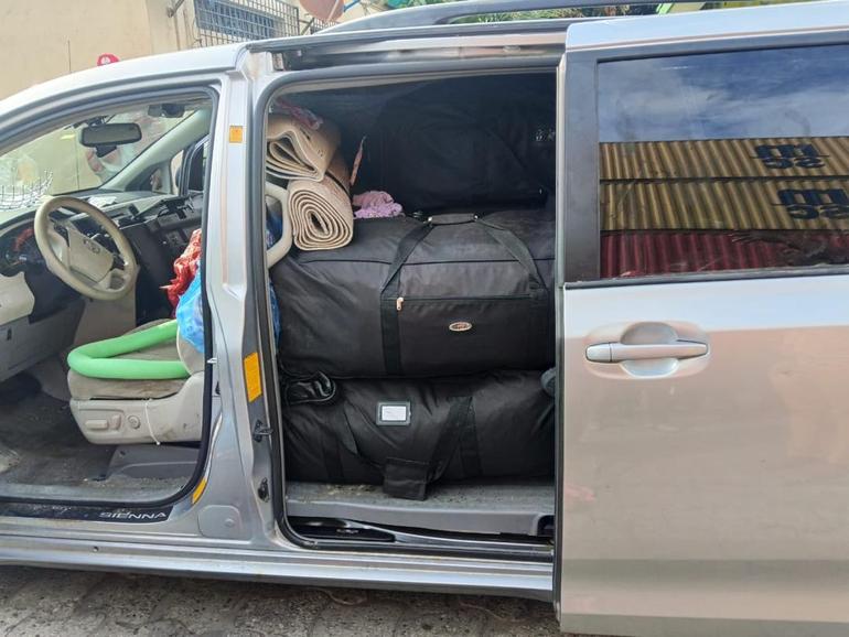 Officers found the drugs concealed in 31 black jumbo bags inside two Toyota Sienna vehicles