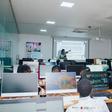 Young Nigerian students learning digital skills in a fully equipped computer lab classroom during the BeMINT training program in Nigeria.