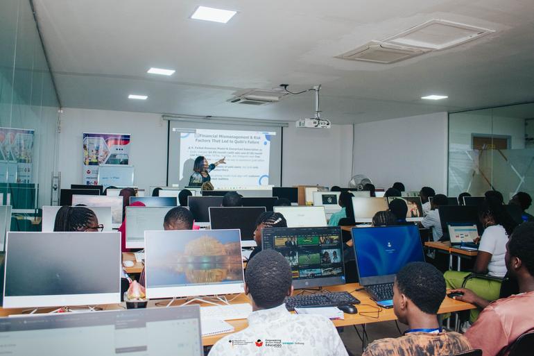 Young Nigerian students learning digital skills in a fully equipped computer lab classroom during the BeMINT training program in Nigeria.