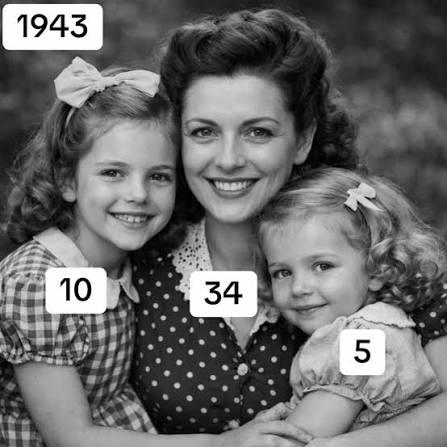 Black and white 1943 portrait of a 34-year-old Ethel Caterham, now the world's oldest person, smiling with her two young daughters.