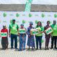 Glo’s Commercial Coordinator, Yomi Ogunbamowo (3rd left), Head, CSR, Jumobi Mofe-Damijo (5th right) CSR Manager, Ufuoma Dogun (3rd right) and some of the beneficiaries of the Food Drive initiative held by Glo Foundation, the CSR arm of Globacom.