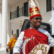 Split image graphic showing billionaire Obi Cubana in traditional attire alongside his official Instagram story debunking the viral rumors.