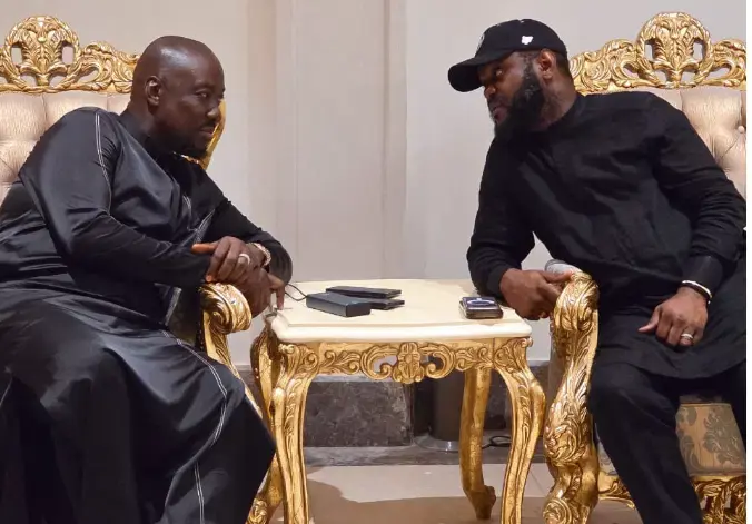 Seyi Tinubu, founder of the City Boy Movement, conversing with hospitality mogul Obi Cubana during a high-profile political strategy meeting.