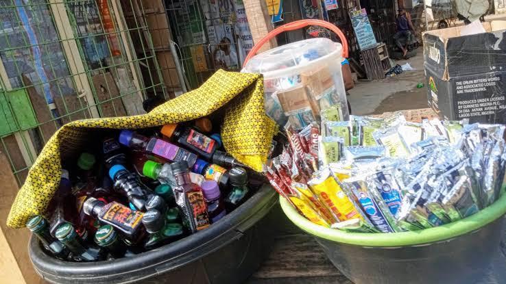 NAFDAC enforcement officers confiscate prohibited small-volume alcoholic drinks and sachets during a nationwide mop-up operation.