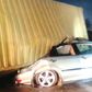Tragedy averted in Lagos as container crushes couple’s car