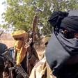 WATCH: Nigerians react as viral video shows alleged armed bandits moving past police officers