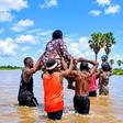 Men carry women on their heads to cross flooded road in Taraba two years after governor promised to fix it during campaign