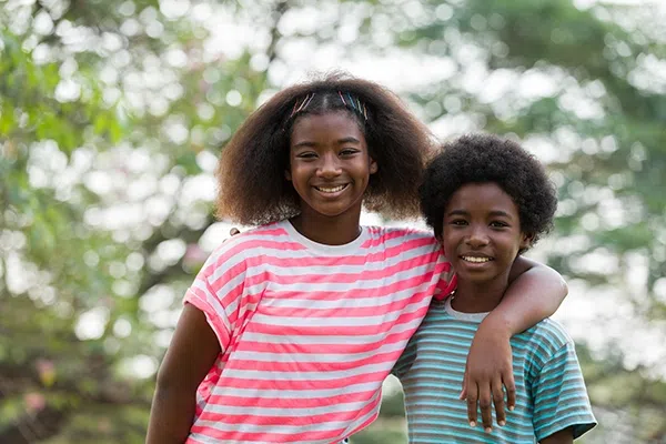Many cases of heteropaternal superfecundation go unnoticed because the twins simply look like typical siblings with slight variations in height, hair, and features.