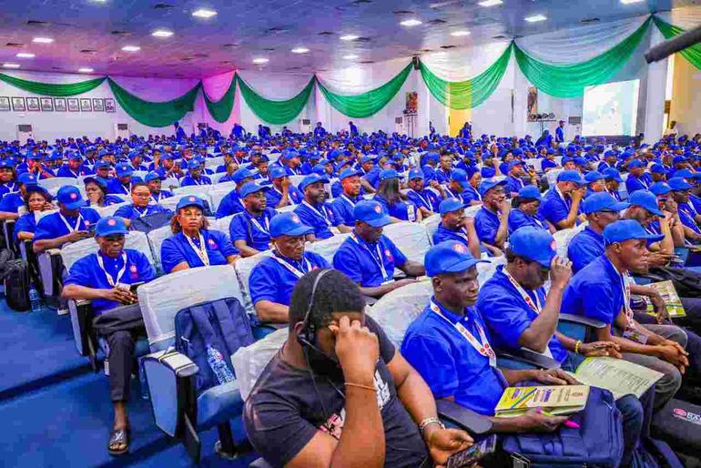Members of the Non-Academic Staff Union NASU in blue shirts and caps at a national delegates' meeting in Nigeria
