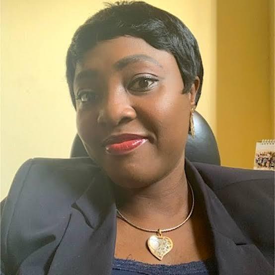 Lagos District Coroner Magistrate Temitope Oladele wearing a black blazer and a heart-shaped gold necklace.