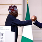 Nigerians react as French President Macron blows pidgin to welcome Tinubu