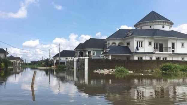 Luxury estates in Isheri completely cut off after the Ogun River overflowed its banks.